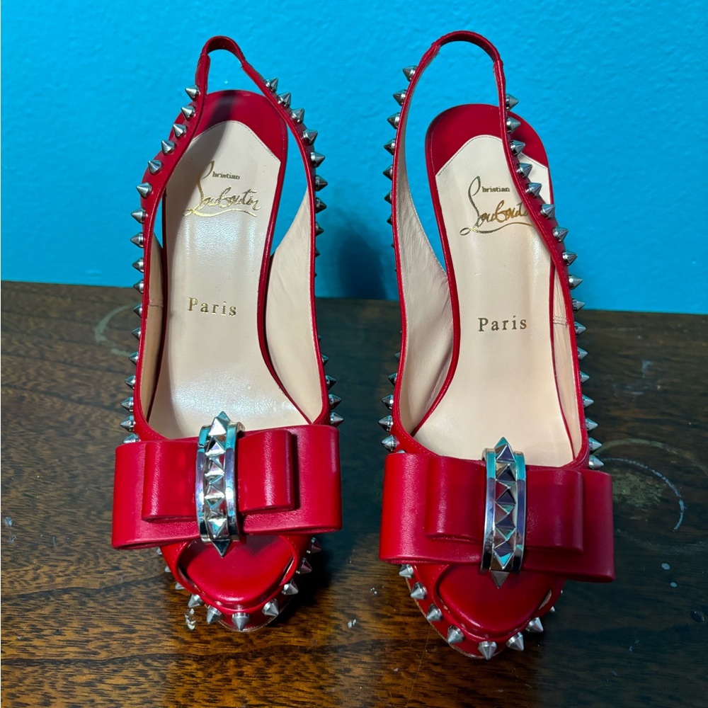 Red studded Christian Louboutin heels